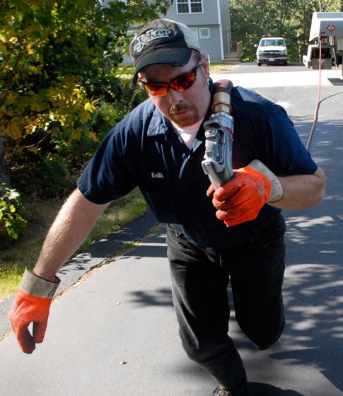 Domino Fuel technician rushing to deliver emergency heating oil in Hauppauge, NY
