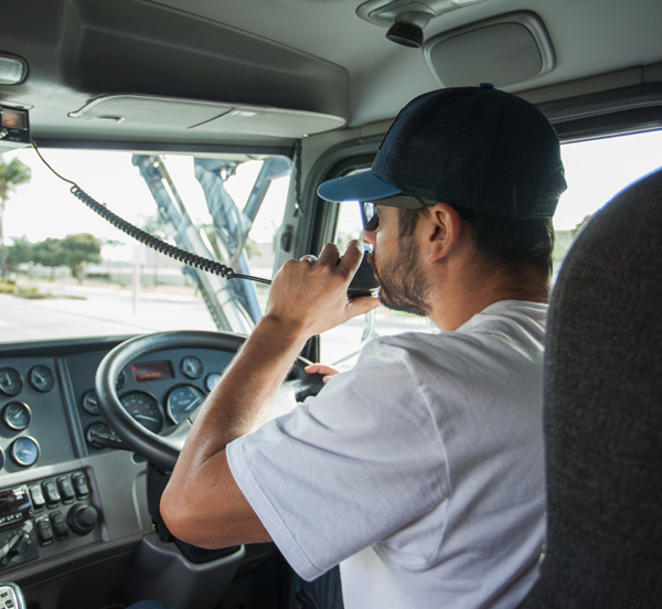Domino Fuel oil delivery driver in his truck serving Hauppauge, NY